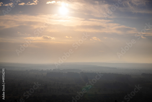 Wide angle view over the beautiful Italian landscape at sunset from Castel del monte - travel photography