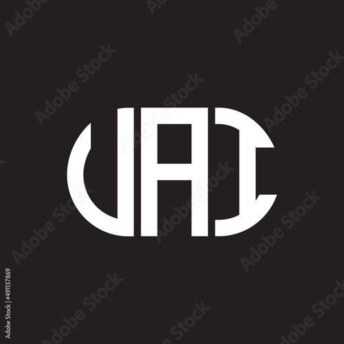 UAI letter logo design on black background. UAI creative initials letter logo concept. UAI letter design. photo