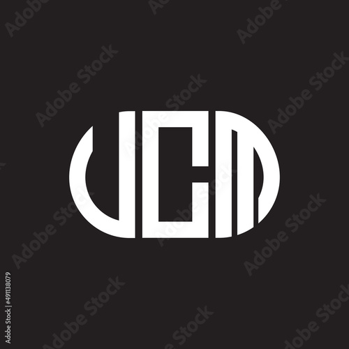 UCM letter logo design on black background. UCM creative initials letter logo concept. UCM letter design. photo