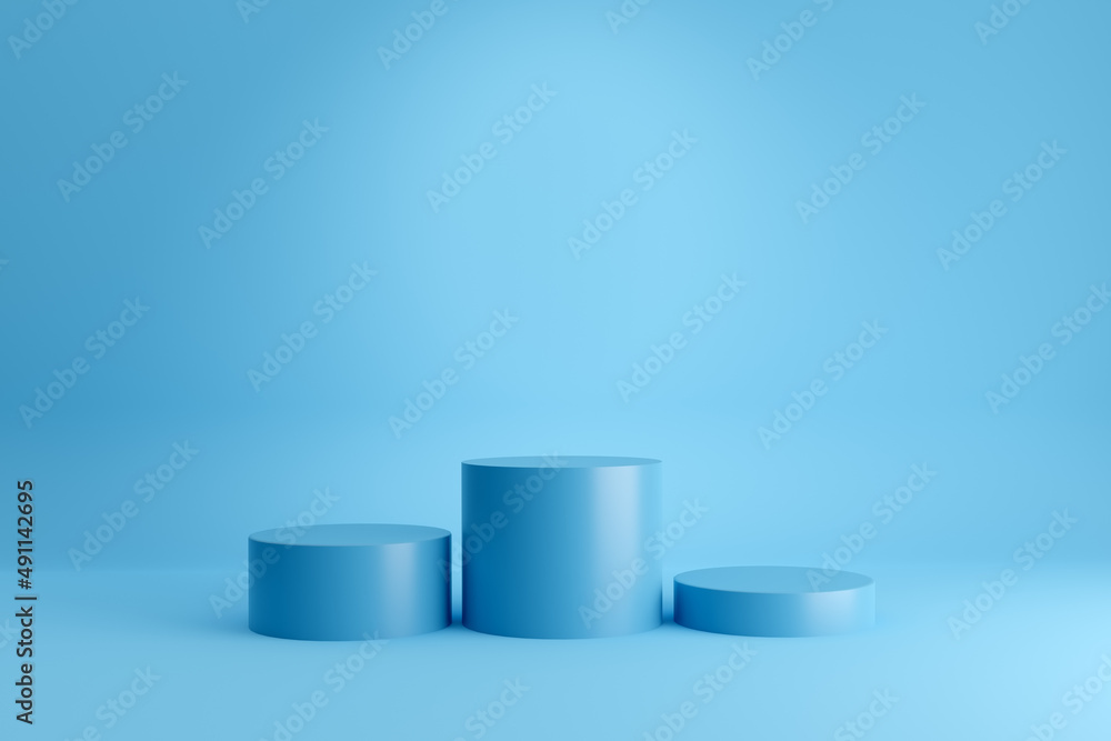 Winners podium or pedestal with empty cylindrical platforms on blue background. Winners podium or pedestal with empty cylindrical platforms on blue background.