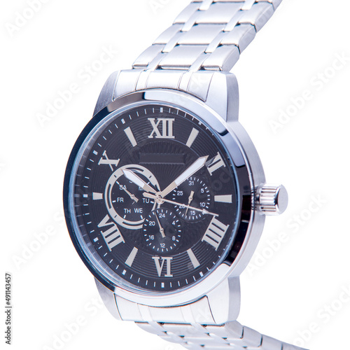 Wrist watch is silver color on white background.
