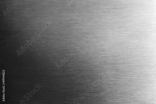 Metal background. Silver steel texture. Brushed stainless sheet