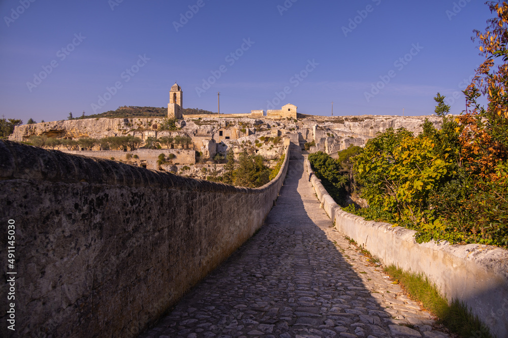 The historic village of Gravina in Puglia with its famous aqueduct bridge - travel photography