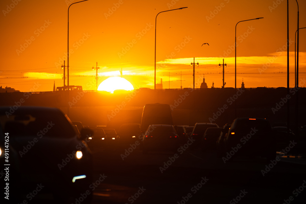 Road with cars at sunset