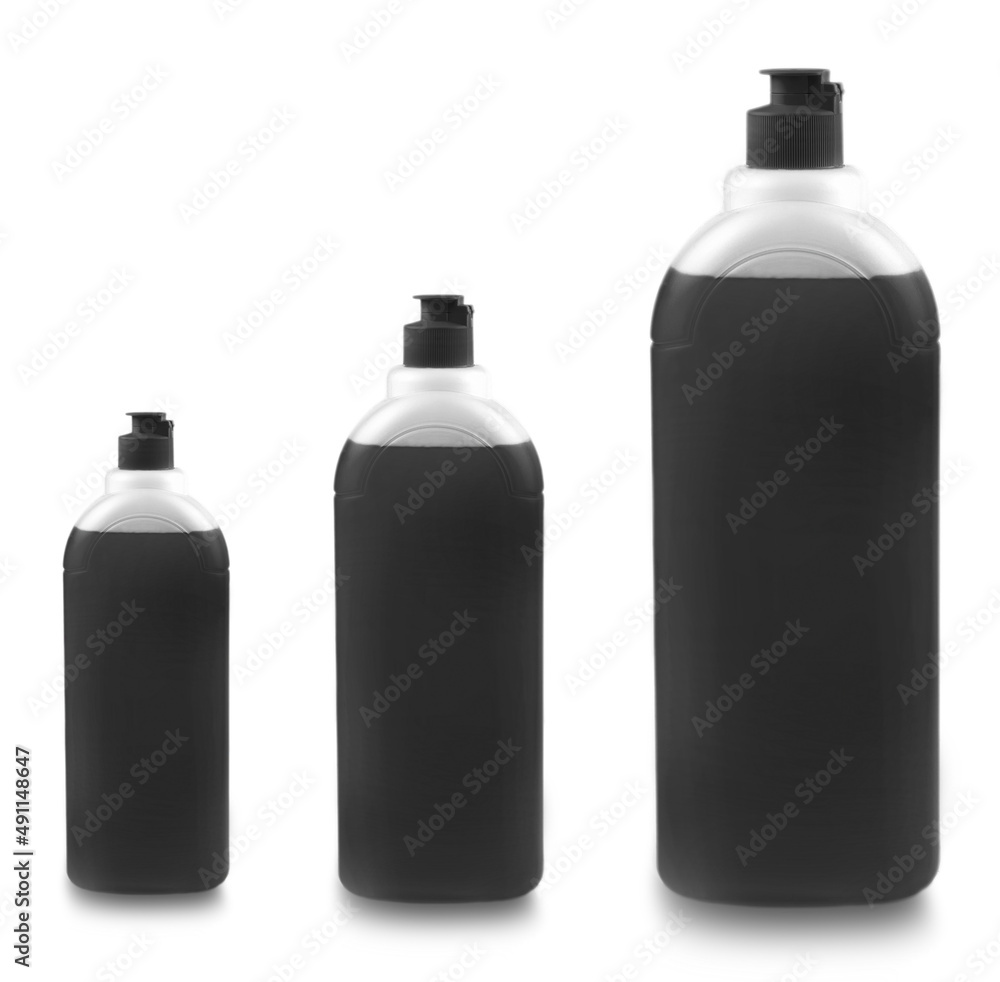 Set of black bottles with dishwashing detergent on white background Set of black bottles with dishwashing detergent on white background