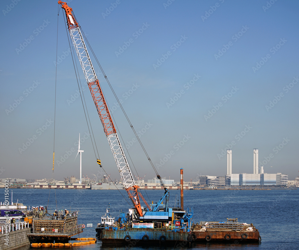Offshore cranes at work sites in Japanese ports