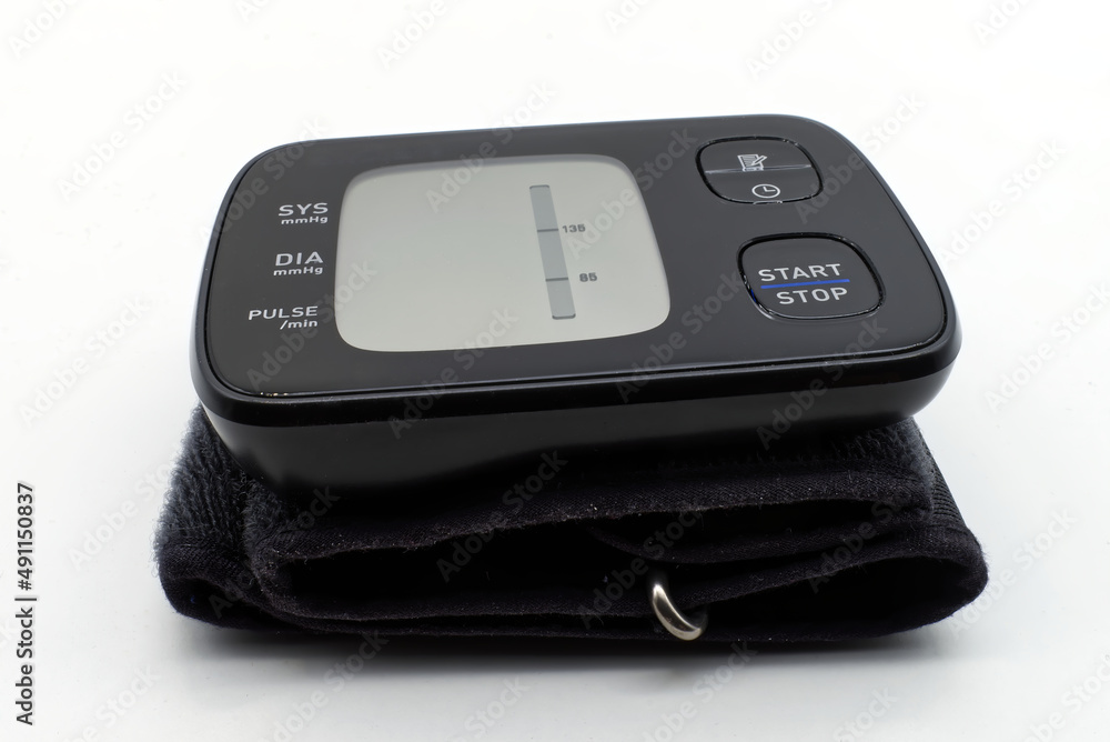 Digital blood pressure wrist tonometer isolated on a white background Digital blood pressure wrist tonometer isolated on a white background