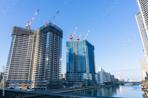 Tower condominium under construction and large crane_15