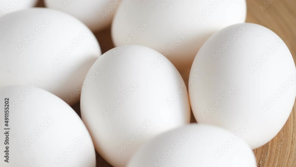 Chicken egg, rotation shot, Chicken fresh raw eggs.Healthy fresh food ingredients for breakfast. Animal products. Grocery. Chicken farm fresh eggs Chicken egg, rotation shot, Chicken fresh raw eggs.Healthy fresh food ingredients for breakfast. Animal products. Grocery. Chicken farm fresh eggs