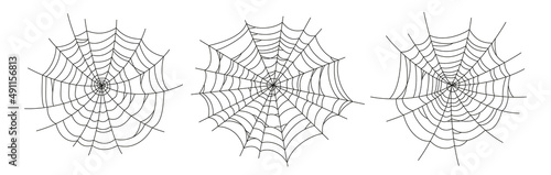 Scary spider webs. Black cobweb silhouette isolated on white background. Set of doodle spidewebs. Hand drawn cob webs for Halloween party. Vector illustration.