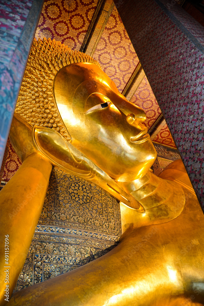 Ancient buddha statue in wat Thai or Thai temple. Giant Buddha god worship, Asian architecture art landmark, famous shrine for tourism. History spiritual temple of god. Travel Thailand attraction.