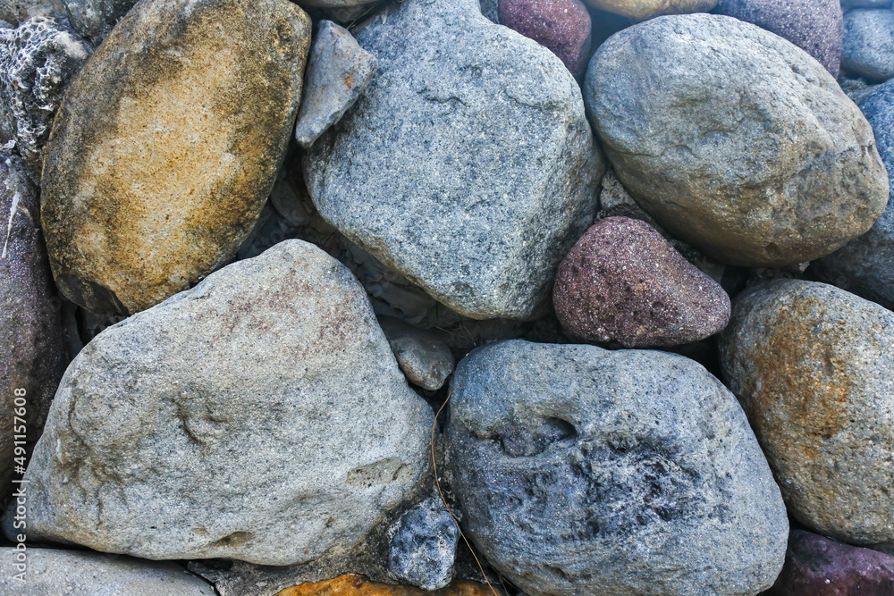 top view of abstractly arranged large and small rocks top view of abstractly arranged large and small rocks