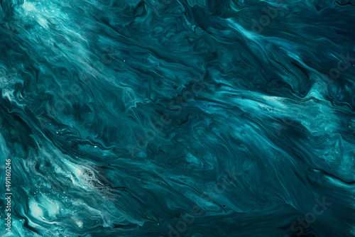Fluid Art. Liquid dark turquoise abstract drips and wave. Marble effect background or texture