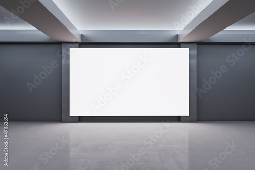 Modern spacious concrete exhibition interior with empty white mock up canvas. Gallery concept. 3D Rendering.