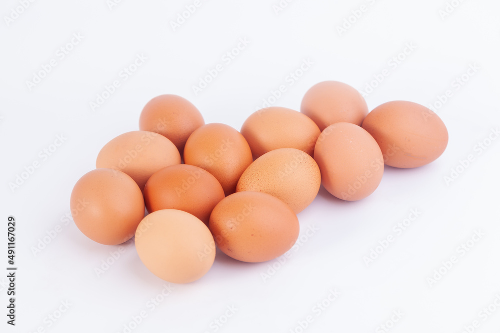 Several chicken eggs are placed on a white background... Several chicken eggs are placed on a white background...