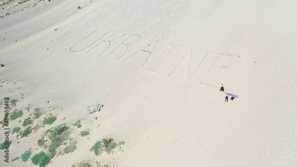 2022 - aerial of the word Ukraine written on sand dunes at Pt. Magu near Malibu, California. 2022 - aerial of the word Ukraine written on sand dunes at Pt. Magu near Malibu, California.