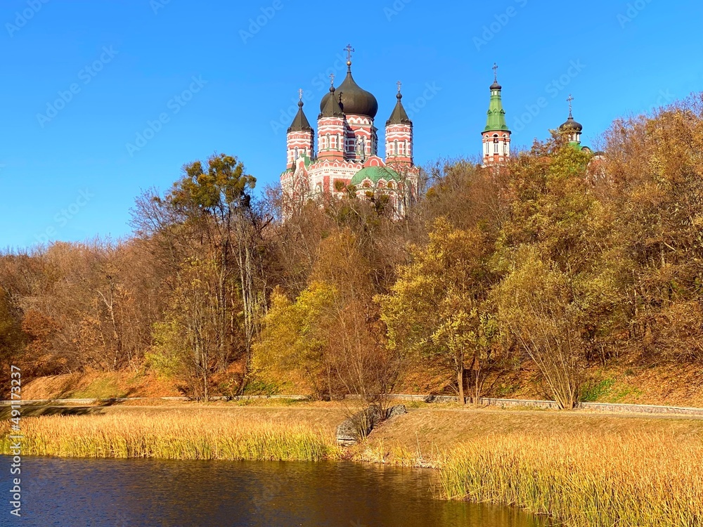 Kyiv Ukraine orthodox church in the autumn park Theophania. Majestic St. Panteleimon Monastery. Kyiv Ukraine orthodox church in the autumn park Theophania. Majestic St. Panteleimon Monastery.