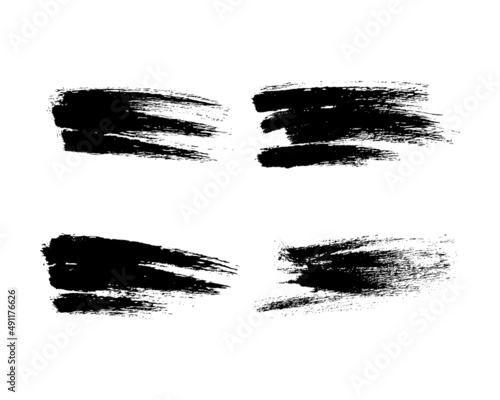 Set of black hand drawn brush strokes