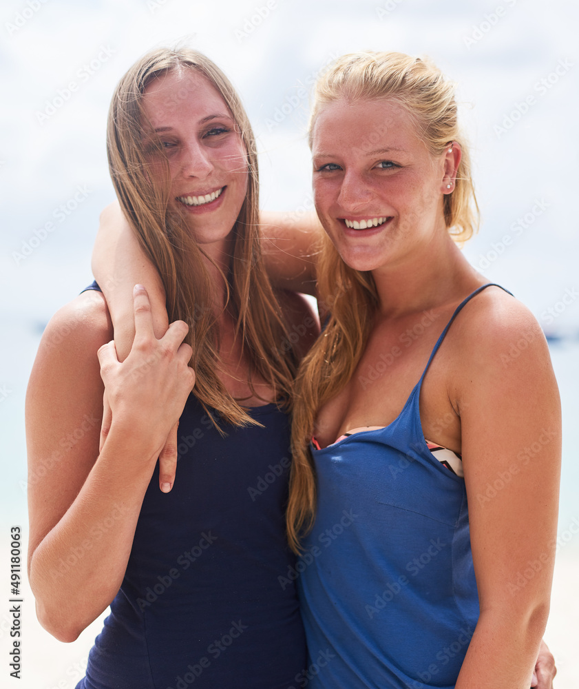 Summertime fun is our thing. Portrait of two young friends bonding together outside. Summertime fun is our thing. Portrait of two young friends bonding together outside.