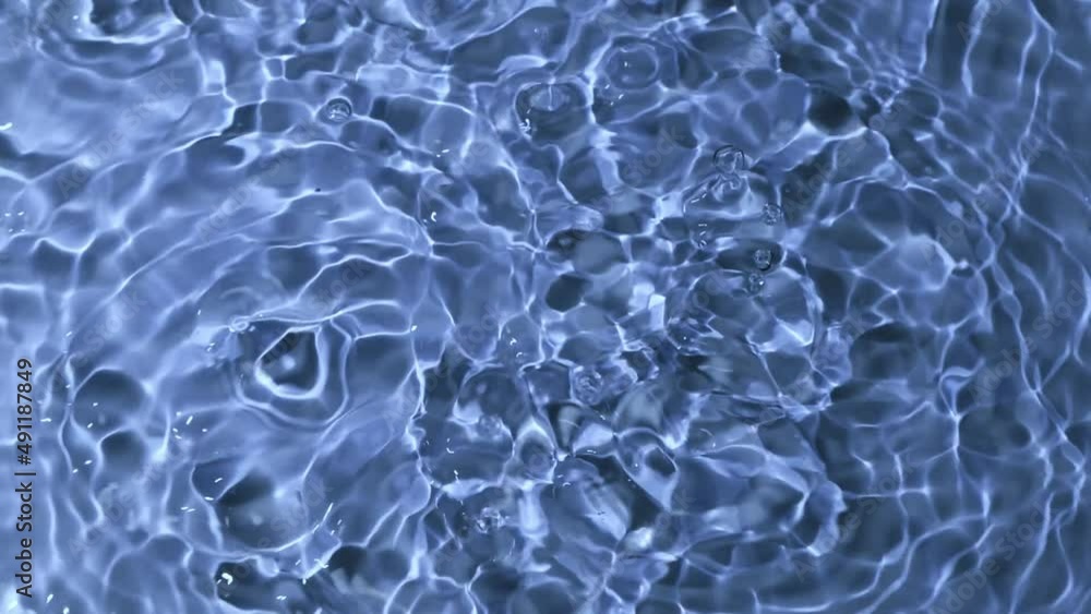 Water drop falling down in slow motion, Top view
Water drop falling down in slow motion, Top view