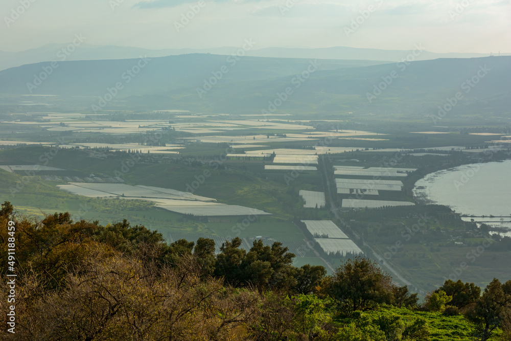 Top view of the greenhouses and Kinneret lake 