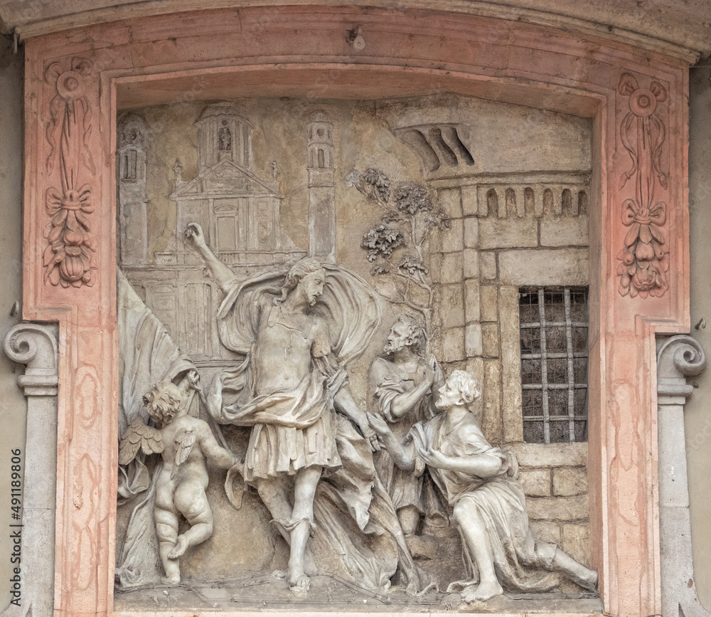 religious bas-relief on the facade of a catholic church.Milan, Italy.