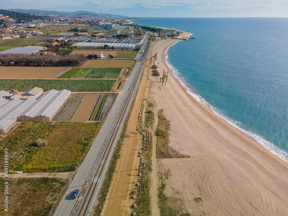 Aerial images of the beach of Malgrat de Mar in the Maresme Costa Brava pine forest without people drone Aerial images of the beach of Malgrat de Mar in the Maresme Costa Brava pine forest without people drone