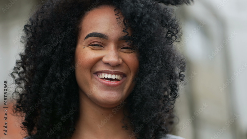 A Happy black woman laughing and smiling a happy African person real life laugh and smile A Happy black woman laughing and smiling a happy African person real life laugh and smile