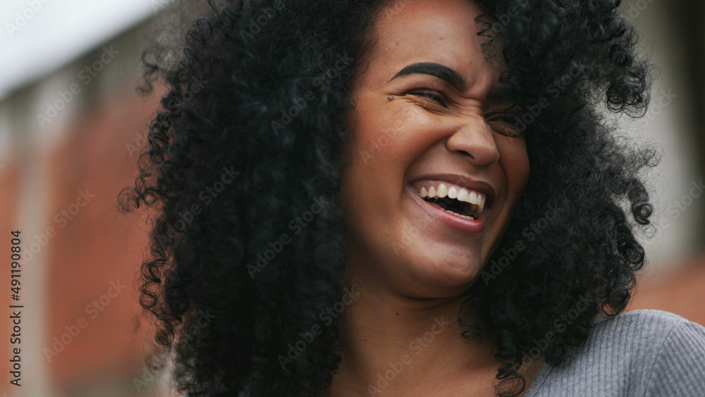 A Happy black woman laughing and smiling a happy African person real life laugh and smile A Happy black woman laughing and smiling a happy African person real life laugh and smile