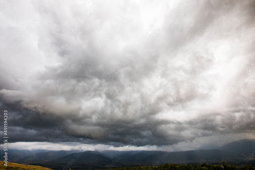 Sunset and dramatic clouds in Cerdanya, Pyrenees, Spain Sunset and dramatic clouds in Cerdanya, Pyrenees, Spain