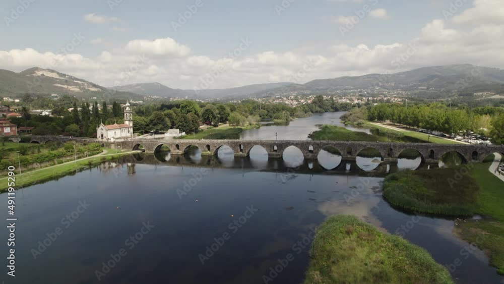 Iconic many-arched stone bridge over Lima river, Ponte de Lima; aerial Iconic many-arched stone bridge over Lima river, Ponte de Lima; aerial