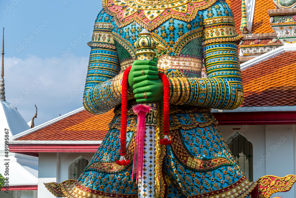 Colorful statue at the Wat Arun Buddhist Temple in Bangkok Colorful statue at the Wat Arun Buddhist Temple in Bangkok