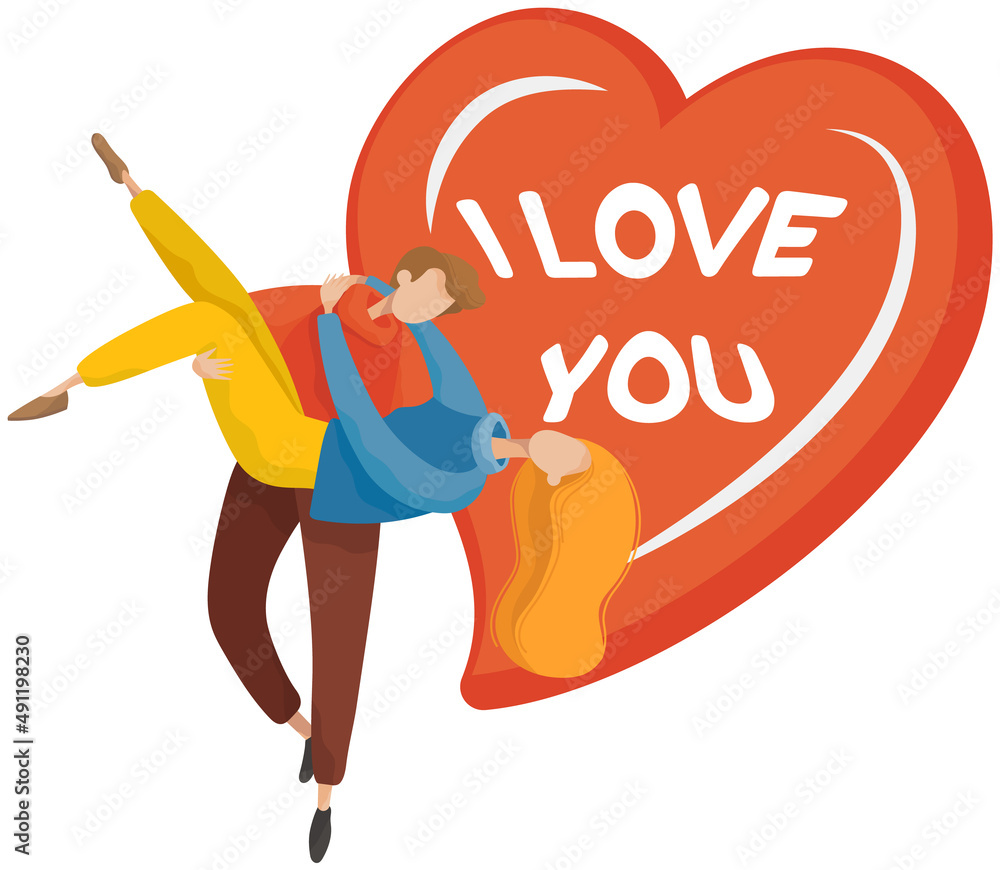 Loving man is carrying his woman. Happy smiling joyful couple on background of inscription I love you on big heart. Guy holds his girlfriend in arms and tilts. People in love having romantic time