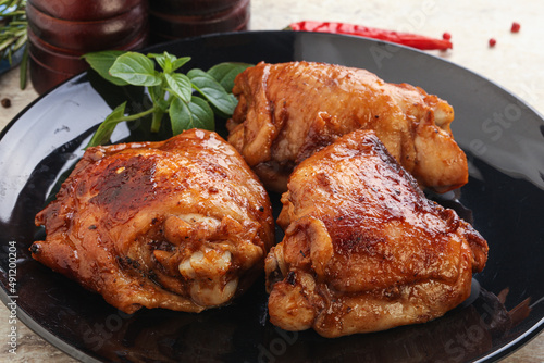 Roasted chicken leg with spicy sauce