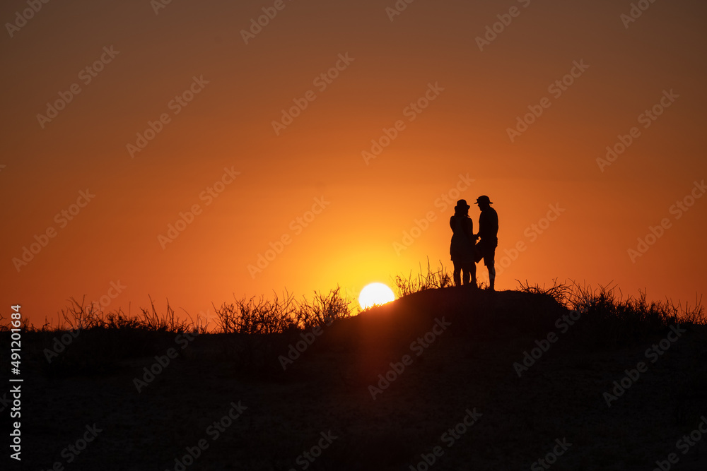 silhouette of a person with sunset background silhouette of a person with sunset background