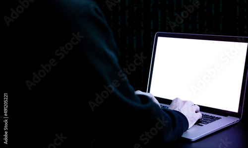 Hacker computer cyber security. Digital laptop in hacker man hand isolated on black banner. Internet web hack technology. Data protection, secured internet access, cybersecurity.