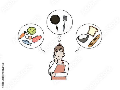 料理　献立を考える主婦　家事　悩む　女性　調理法　夕飯　晩御飯　夕食　朝食　お昼ごはん　