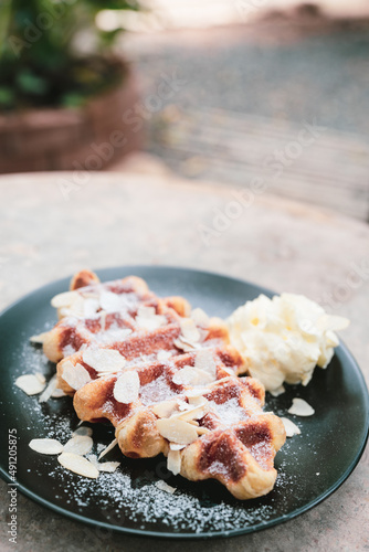 sweet waffle dessert on caf...