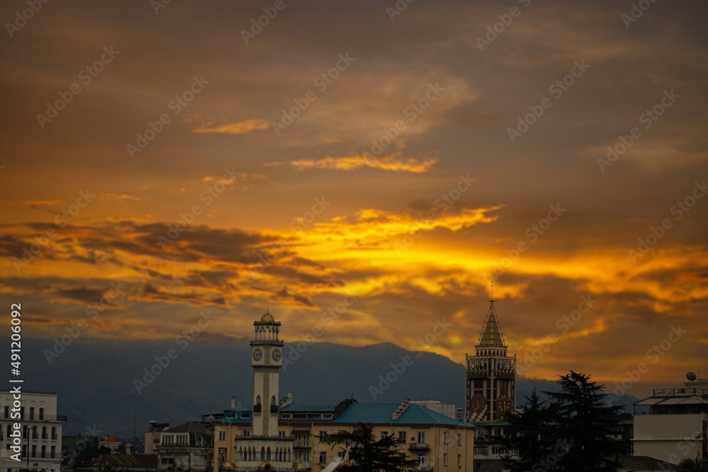 the ancient city of the caucasus at sunset.