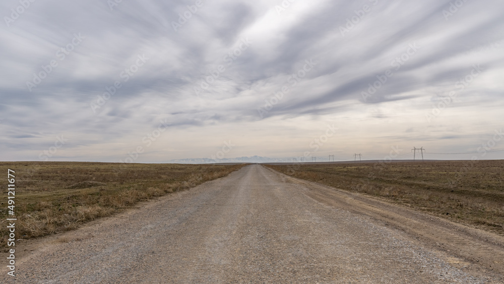 The road through the cloudy steppe
