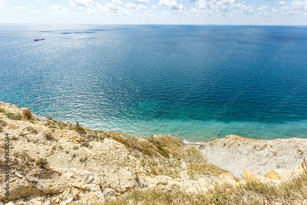 Beautiful landscape of blue sea and mountains on a sunny summer day. The Black Sea coast. Anapa