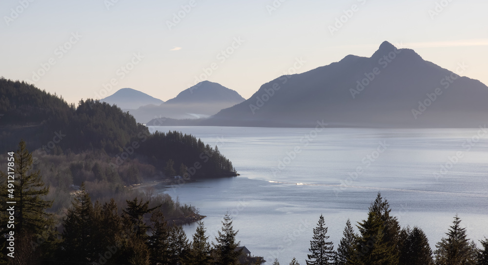 Panoramic View of Britannia Beach during winter evening before sunset. Located in Howe Sound between Squamish and Vancouver, British Columbia, Canada. Panoramic View of Britannia Beach during winter evening before sunset. Located in Howe Sound between Squamish and Vancouver, British Columbia, Canada.