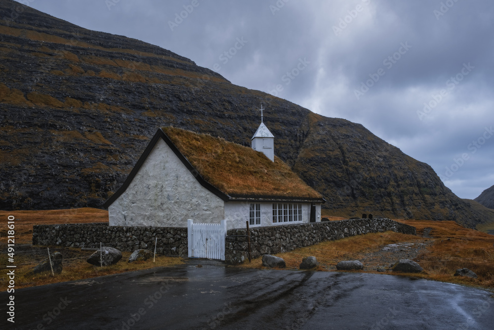 Dramatic november landscape. View of Saksun church, Faroe Islands. Splendid morning scene of Streymoy island, Denmark, Europe. 2021 Dramatic november landscape. View of Saksun church, Faroe Islands. Splendid morning scene of Streymoy island, Denmark, Europe. 2021