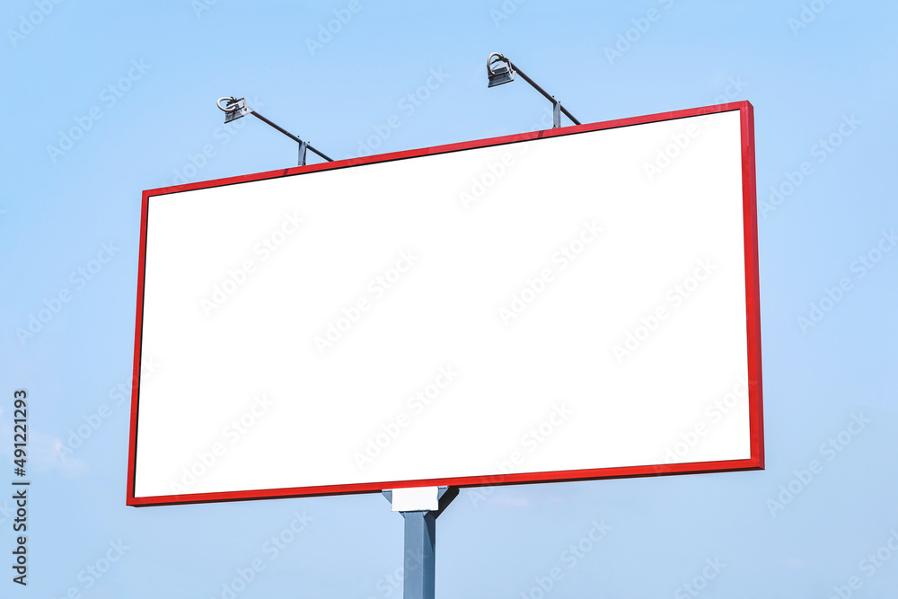 Blank billboard mockup with white screen. Against the backdrop of nature and blue sky. Business concept. Copy space banner for advertising. Blank billboard mockup with white screen. Against the backdrop of nature and blue sky. Business concept. Copy space banner for advertising.