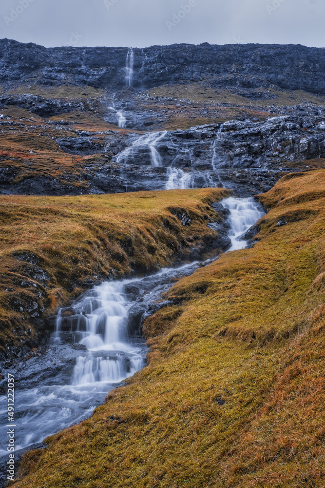 Europe, Faroe Islands. View of the village of Saksun and waterfalls on the island of Streymoy. November 2021 Europe, Faroe Islands. View of the village of Saksun and waterfalls on the island of Streymoy. November 2021
