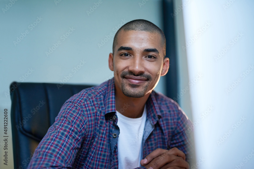 © Nola V/peopleimages.com - You can count on me. Cropped portrait of a young designer in the office.