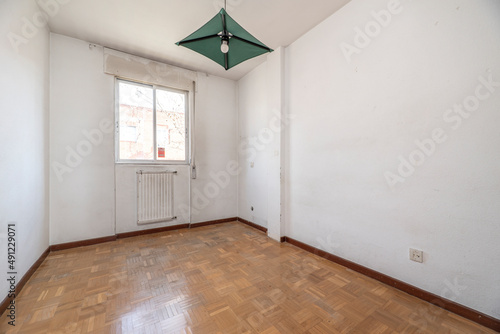 Wallpaper Mural Empty bedroom with French oak parquet flooring with aluminum window and green fabric lamp Torontodigital.ca