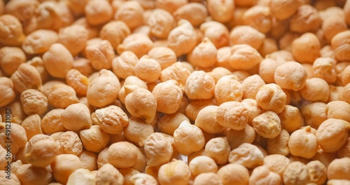 Closeup photo of natural dried chickpeas rotating