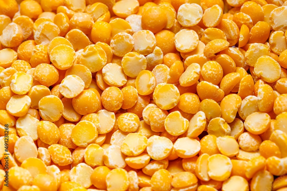 Closeup photo of natural dried yellow peas rotating Closeup photo of natural dried yellow peas rotating