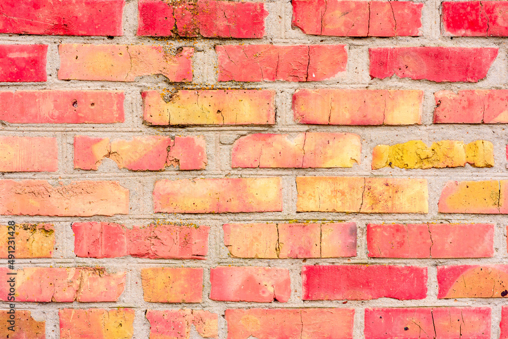 Obraz premium Brick wall with orange brick. Orange brick background